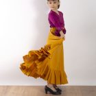 Vestido de baile flamenco infantil Lucero de Paralola; color albero combinado con un bolero buganvilla.